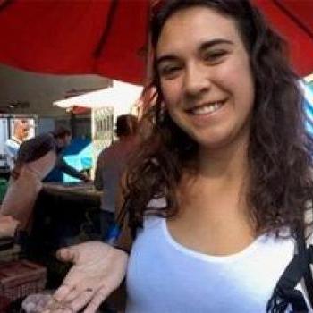 Student holding a starfish